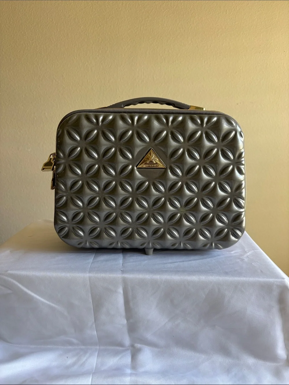 Metallic Gray Quilted Cosmetic Case with Gold Accents